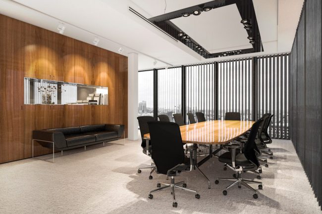 Photo of modern office meeting room illustrates blog: "Is a Property Commercial or Residential? Here’s How To Tell the Difference"